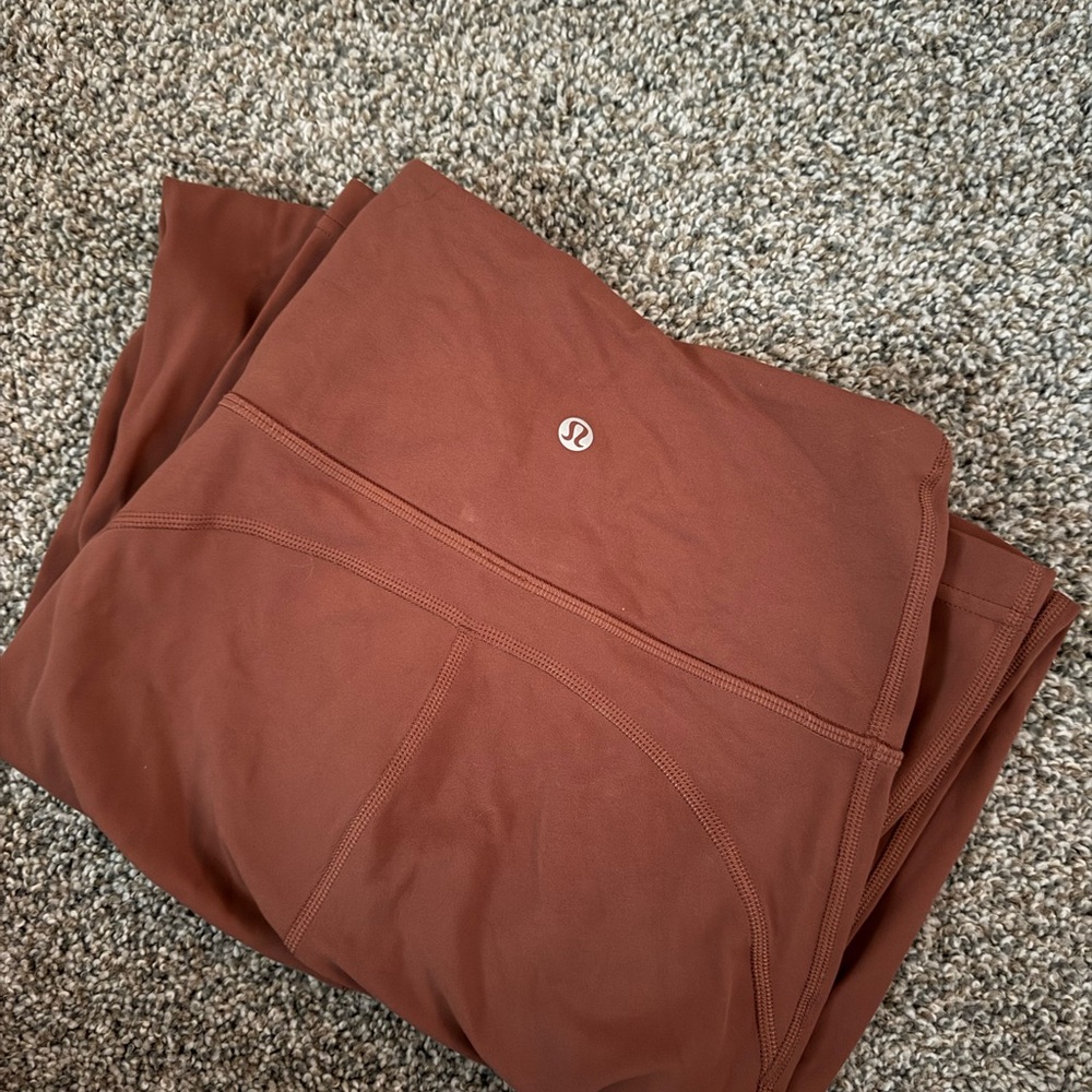 lululemon rust-colored high rise flare leggings